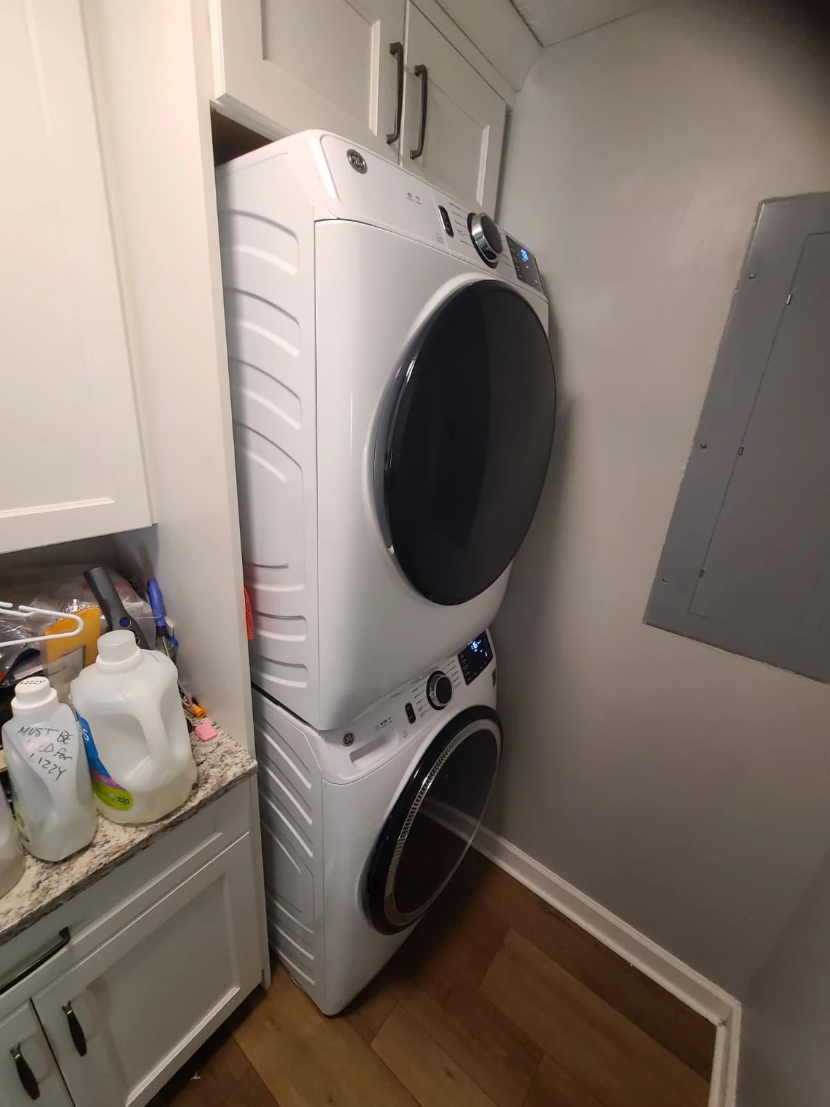 GE washer and gas dryer reassembled in the Carmel laundry room