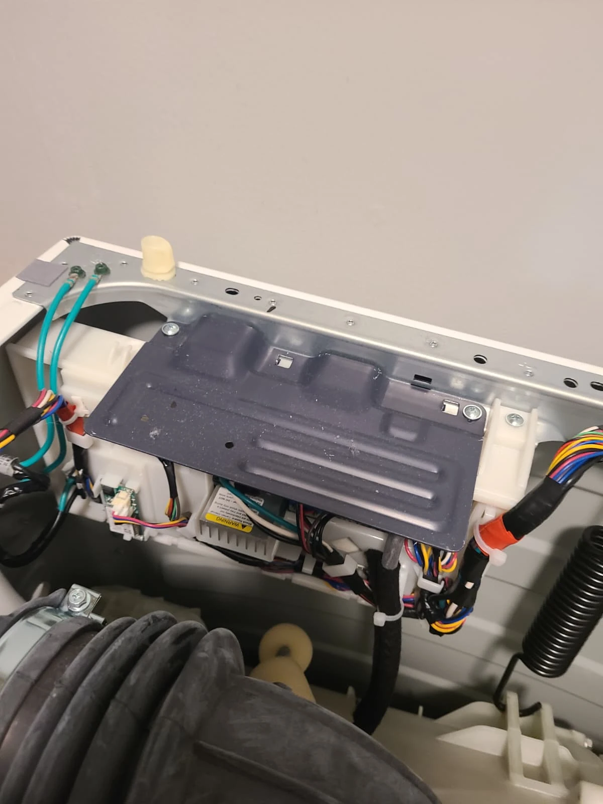 Control-board housing inside the opened GE washer