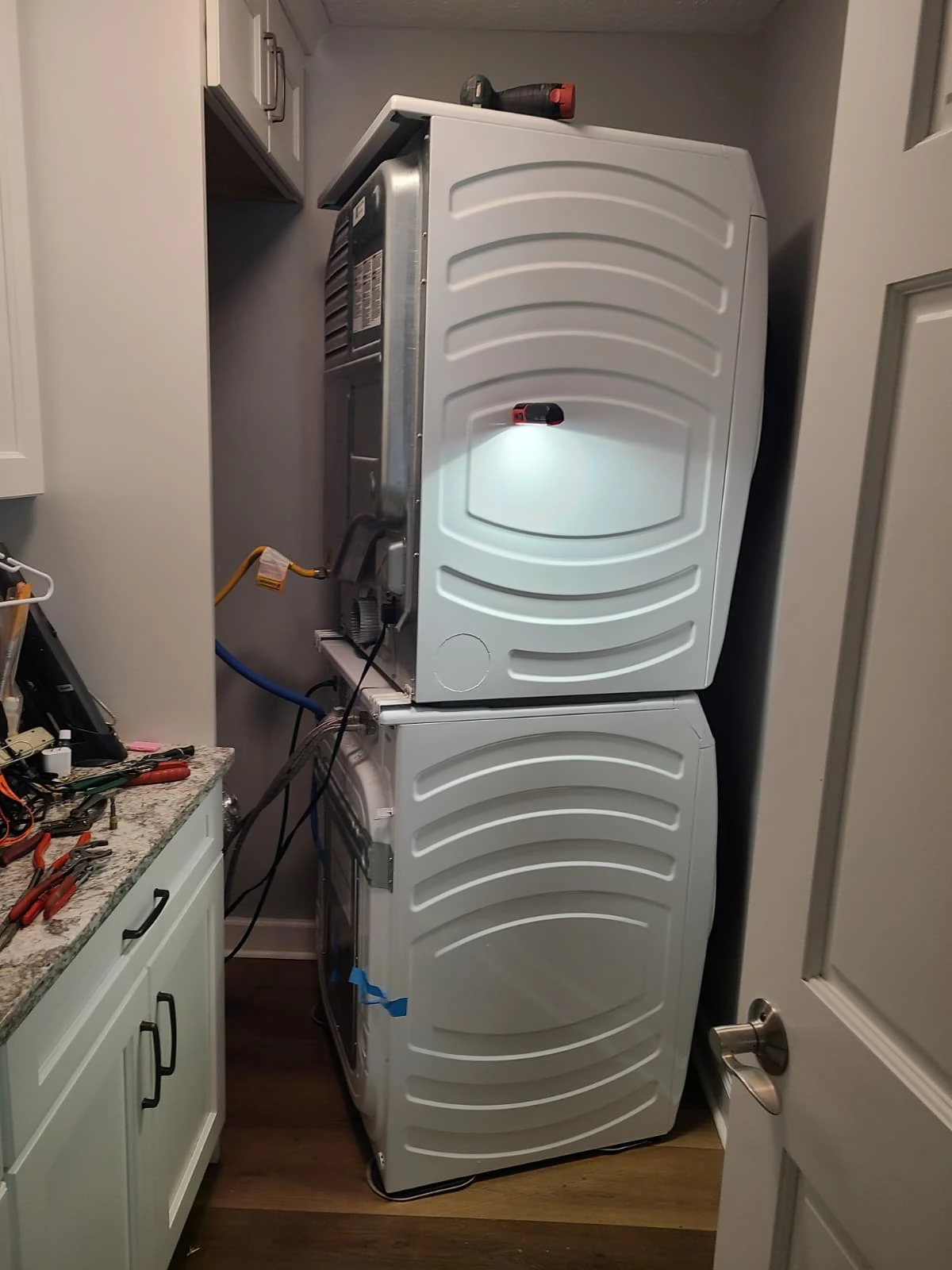 Gas dryer back above the washer while rear connections were being restored