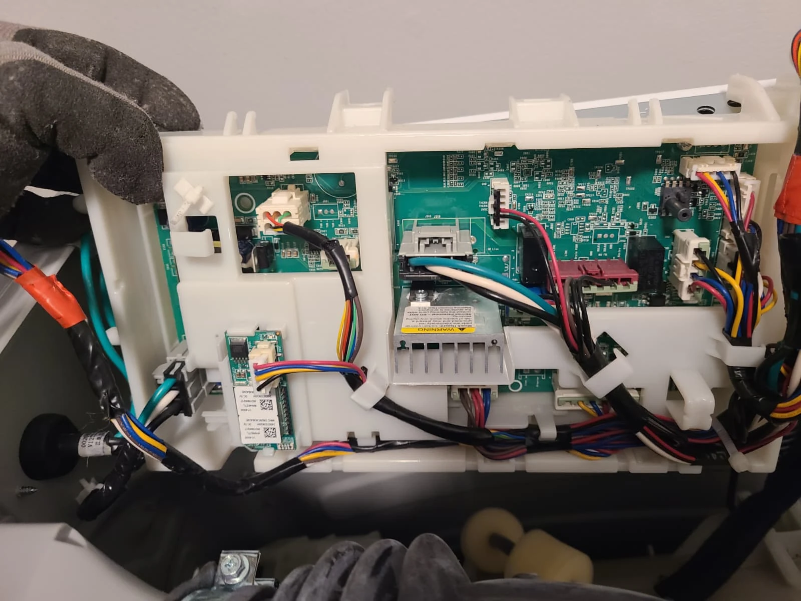 Original washer control board and wiring connections during service