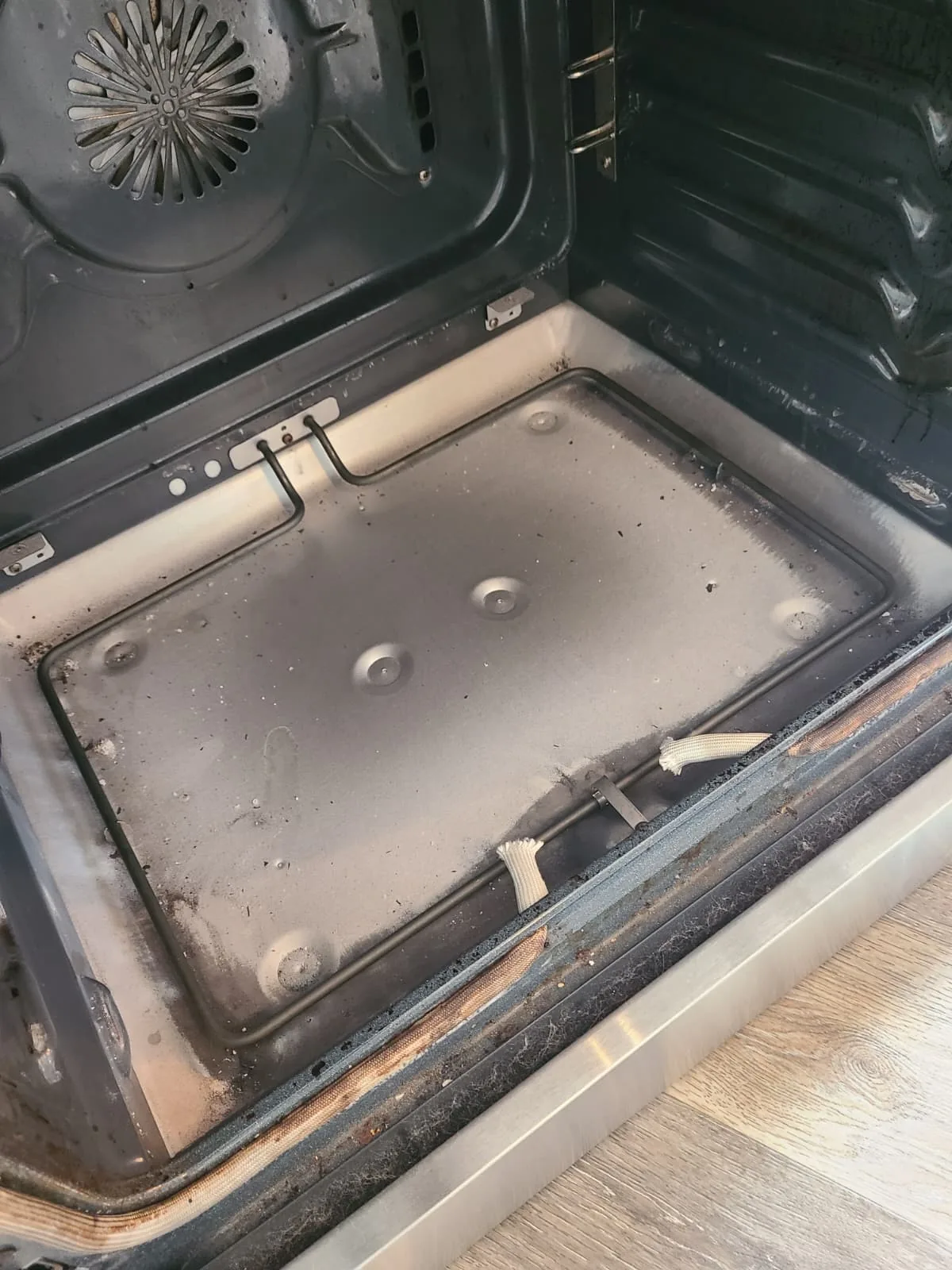 KitchenAid oven cavity opened for bake element access