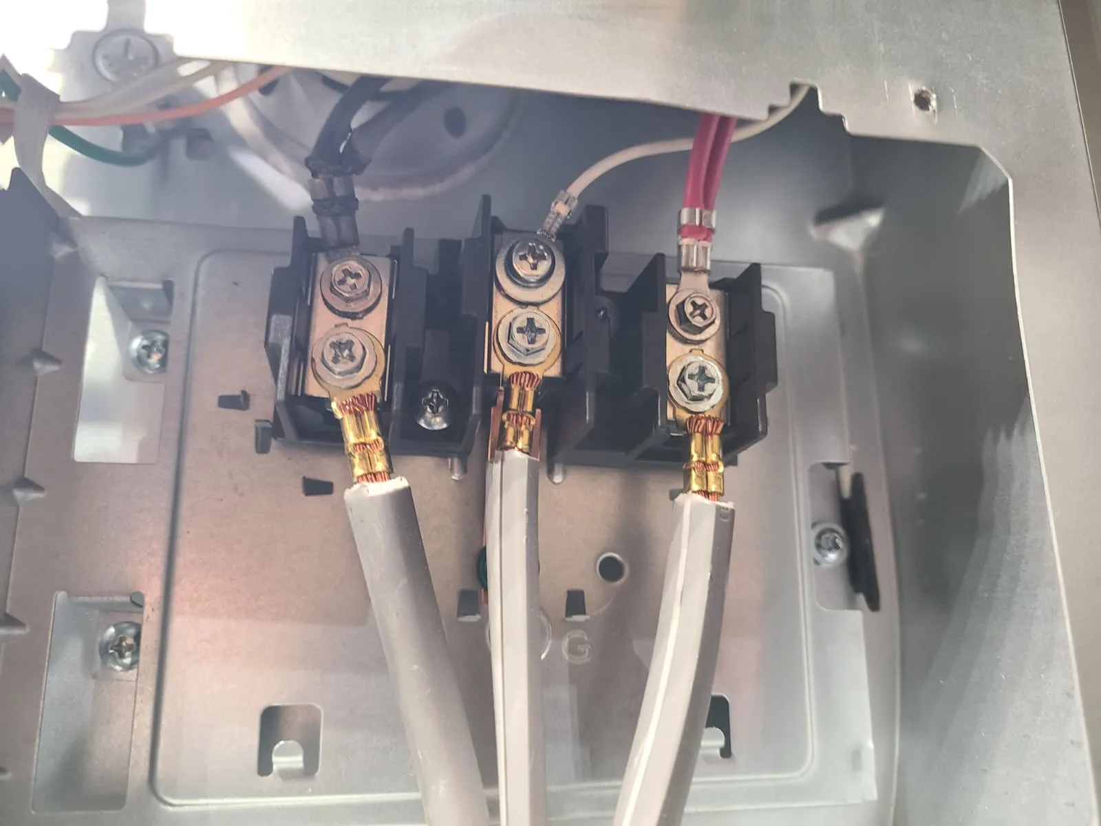 Replacement terminal block and power cord installed on the LG electric range