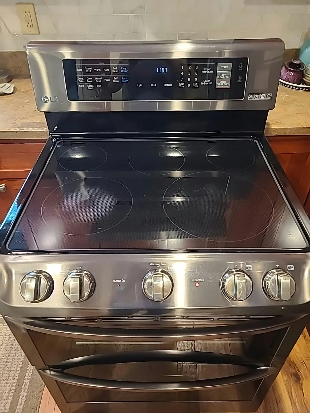 LG LDE4413ST electric range serviced for excessive burner heat in McCordsville, Indiana